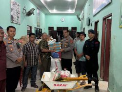 Polres Langkat Bersama Polres Binjai dan Asahan Salurkan Bansos untuk Warga Terdampak Banjir di Desa Bukit Mas
