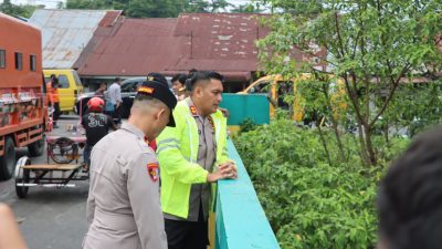 Kapolres Binjai Cek Kondisi Banjir di Kelurahan Setia, Debit Air Sungai Mencirim Berangsur Normal